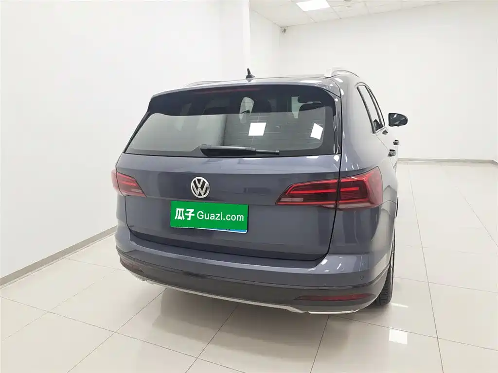 Tharu 330 TSI 4 WD Flagship CN-VI