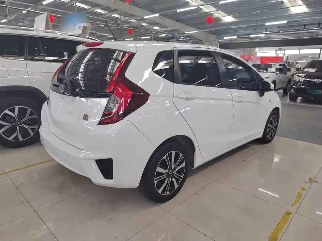 Fit 1.5 L LXS CVT Comfort Sunroof