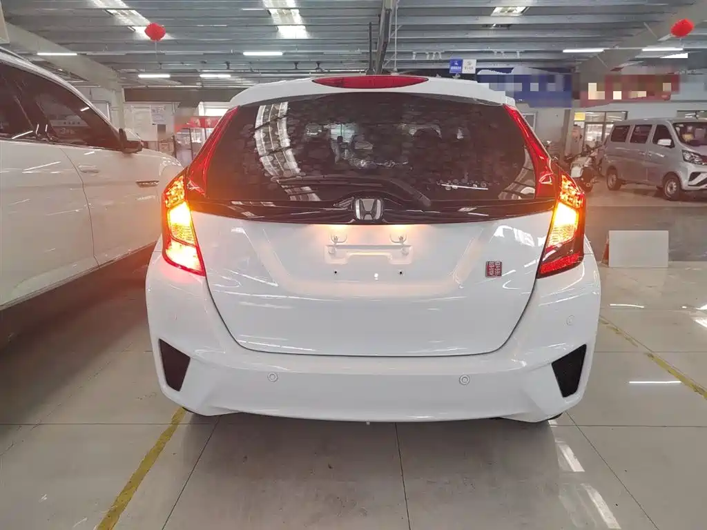 Fit 1.5 L LXS CVT Comfort Sunroof
