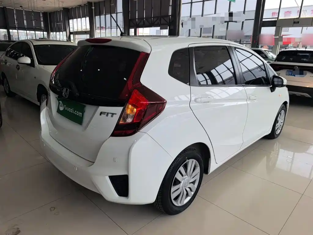 Fit 1.5 L LXS CVT Comfort Sunroof