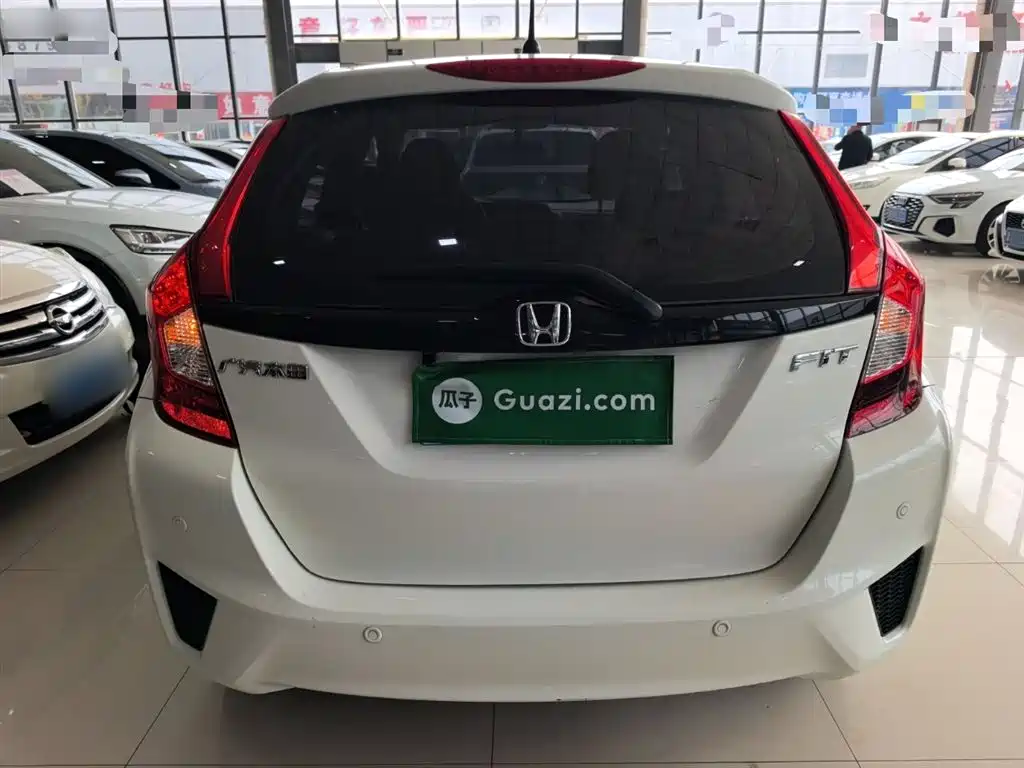 Fit 1.5 L LXS CVT Comfort Sunroof