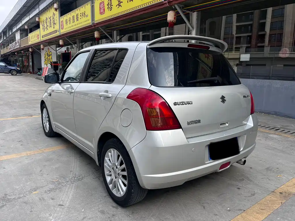 Swift 1.5 L Auto Champion Limited