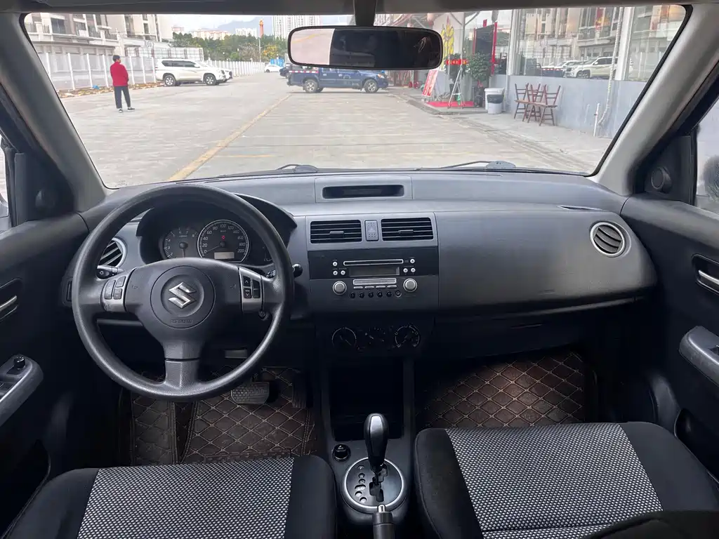 Swift 1.5 L Auto Champion Limited