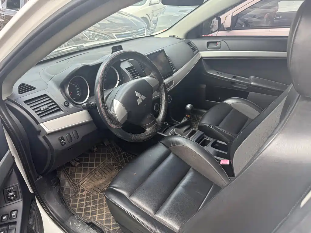 Lancer EX 翼神 2013款 风尚版 1.6 L 手动经典型