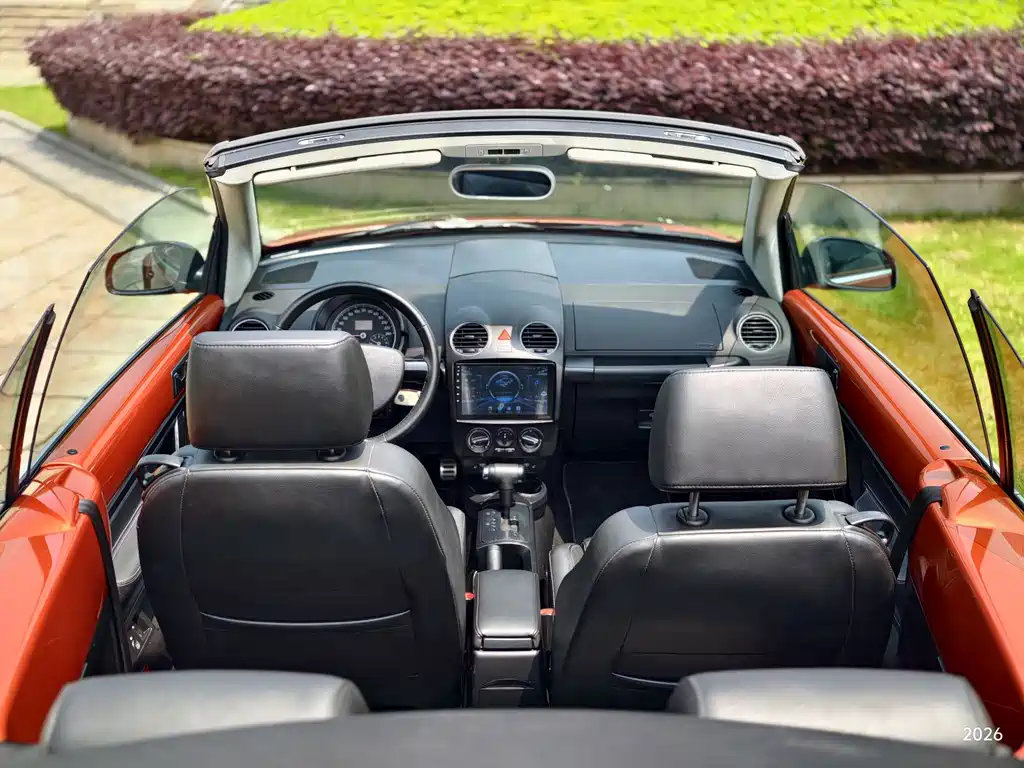 Beetle 2.0 BlackOrange Convertible Luxury