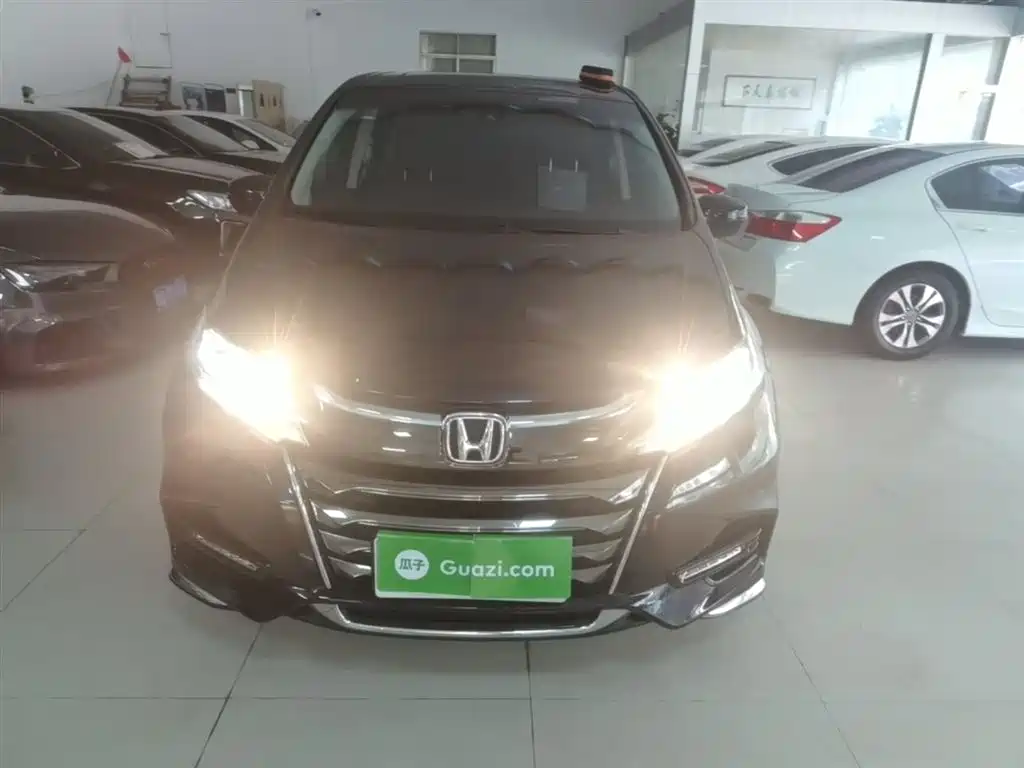 Odyssey 2.0 L Sharp· Premium