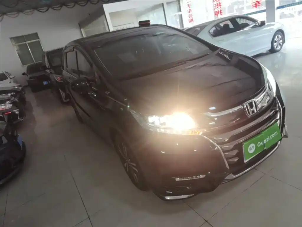 Odyssey 2.0 L Sharp· Premium
