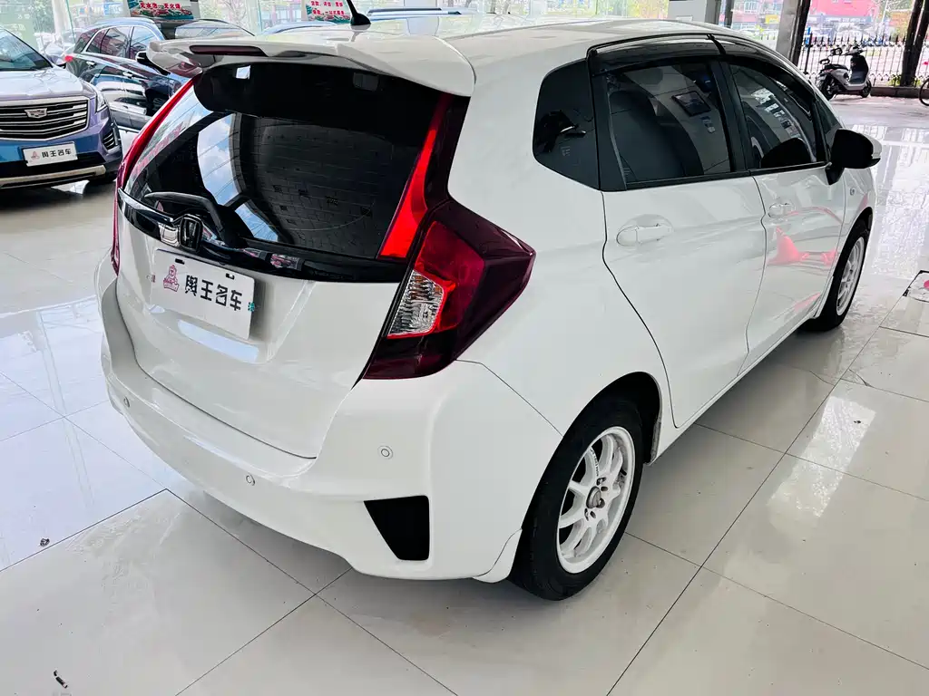 Fit 1.5 L LXS CVT Comfort Sunroof