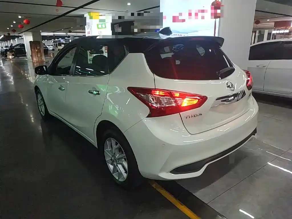 Tiida 1.6 L CVT Smart Travel