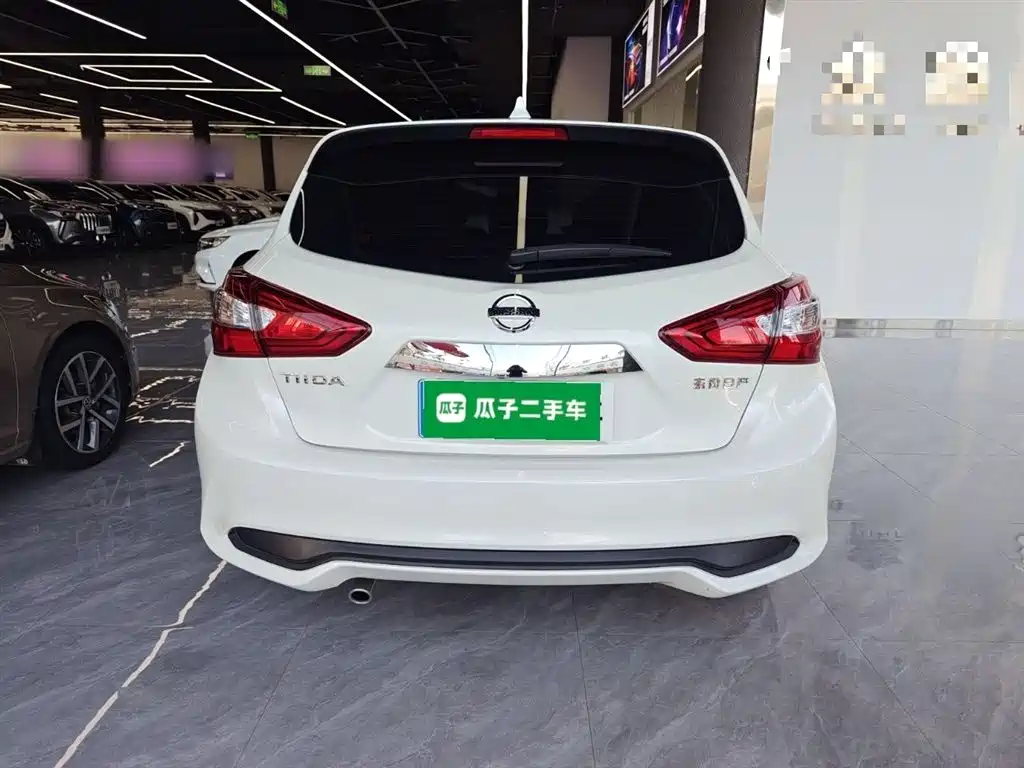 Tiida 1.6 L CVT Smart Travel
